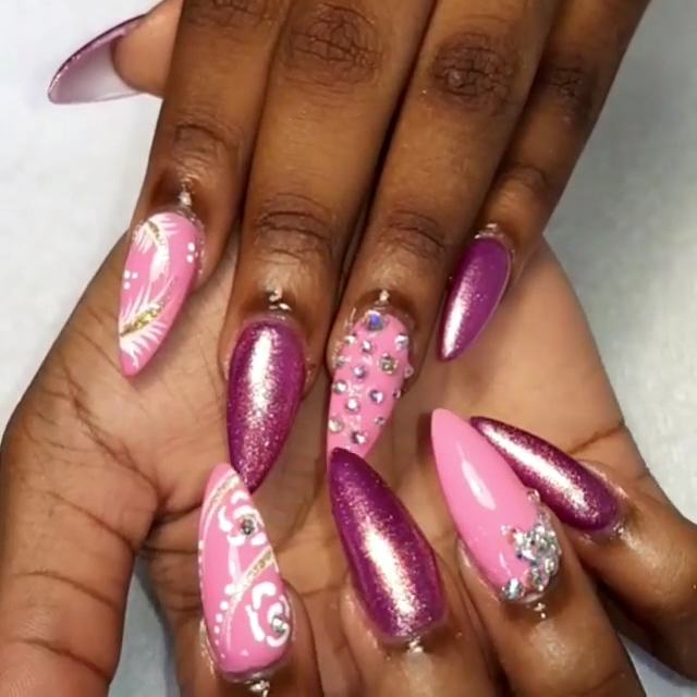 Pink and purple nails with rhinestones and 3D details